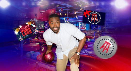 Man Bowling and Surrounded by Prizes